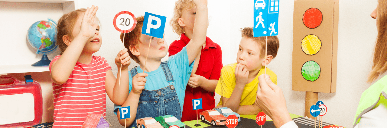 Road safety for kids.
Four young children learning about road safety.
