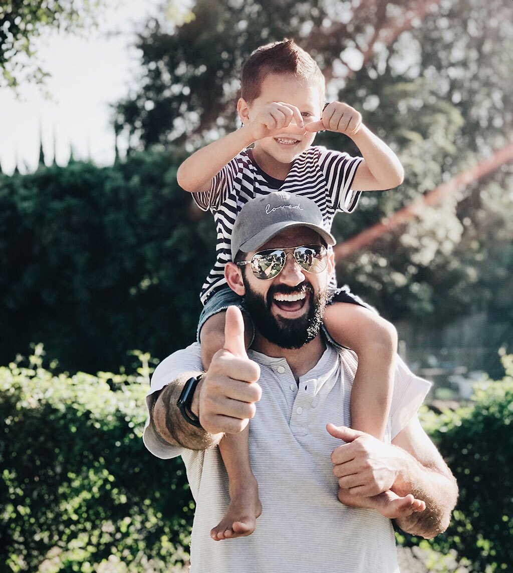 What is foster care? Man with beard with young boy on his shoulders