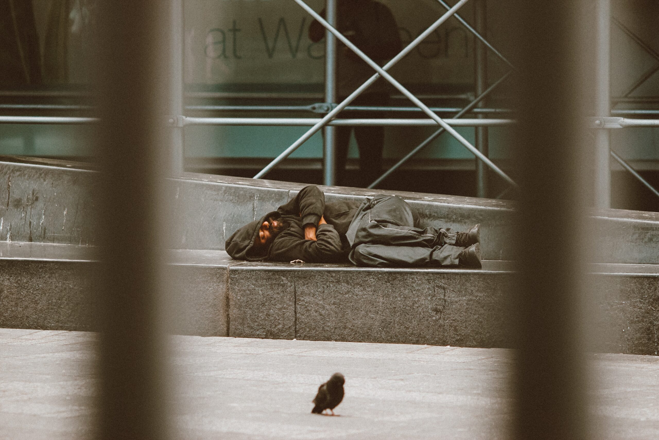 World Day of Social Justice Photo: Homeless man sleeping in street