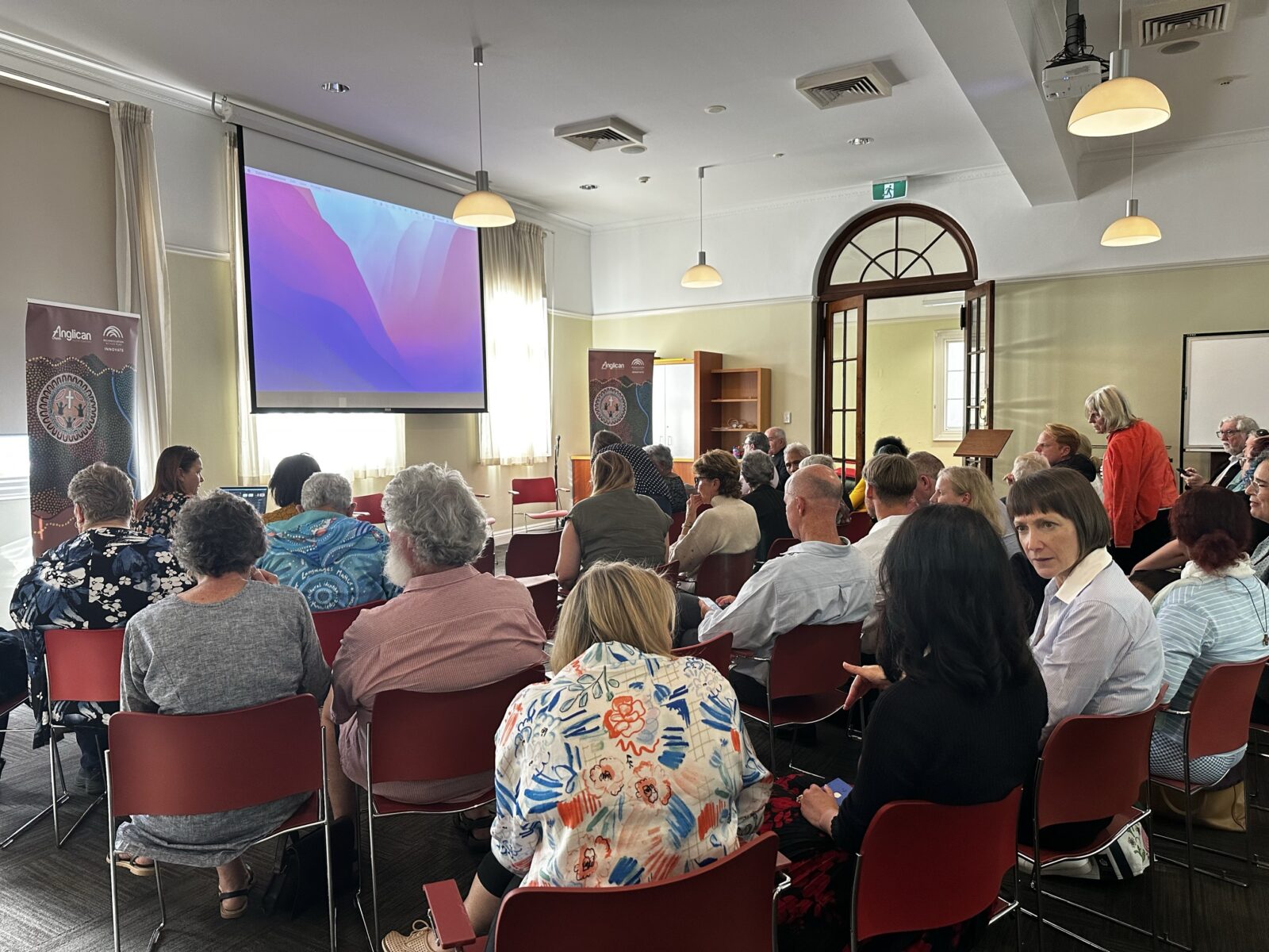 Event goers attending a yarning circle at Anglicare and the Anglican Church's 2024 Reconciliation Week event