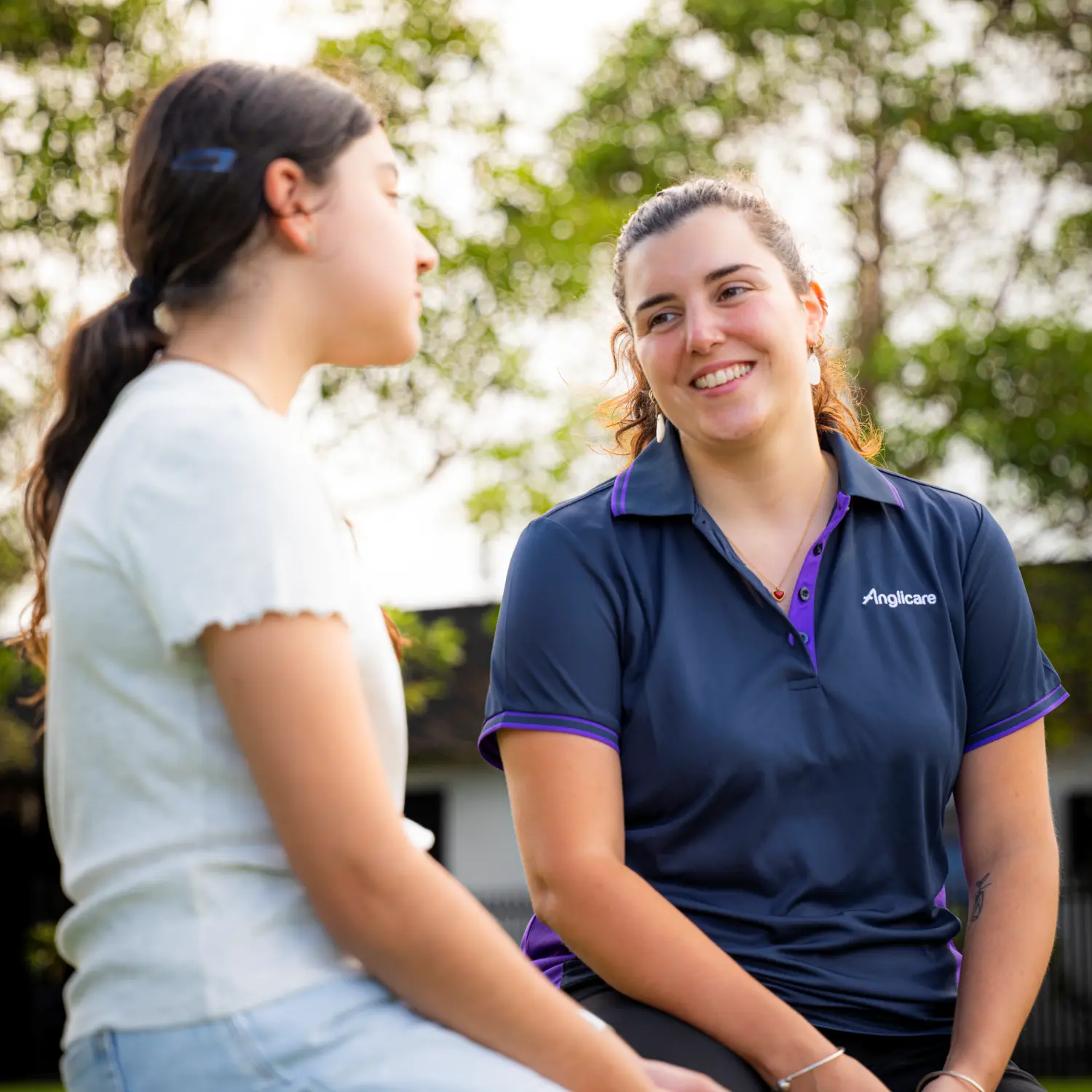 Anglicare youth support worker talking with client