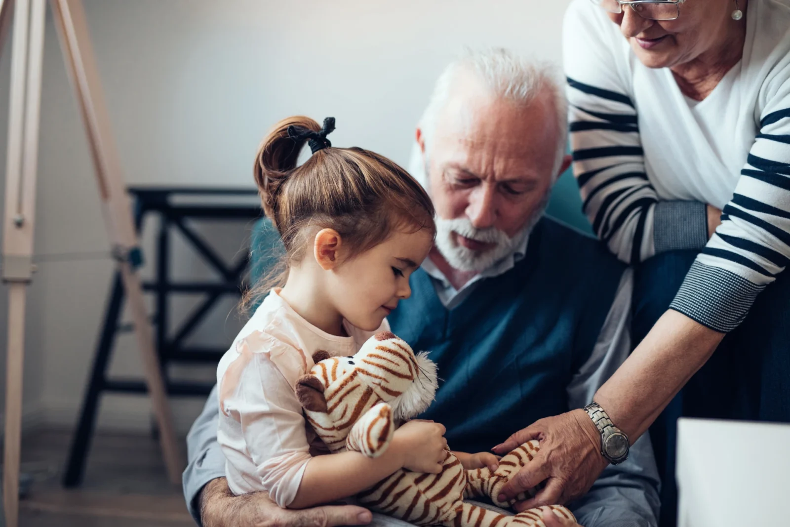 grandparent comforting young child
