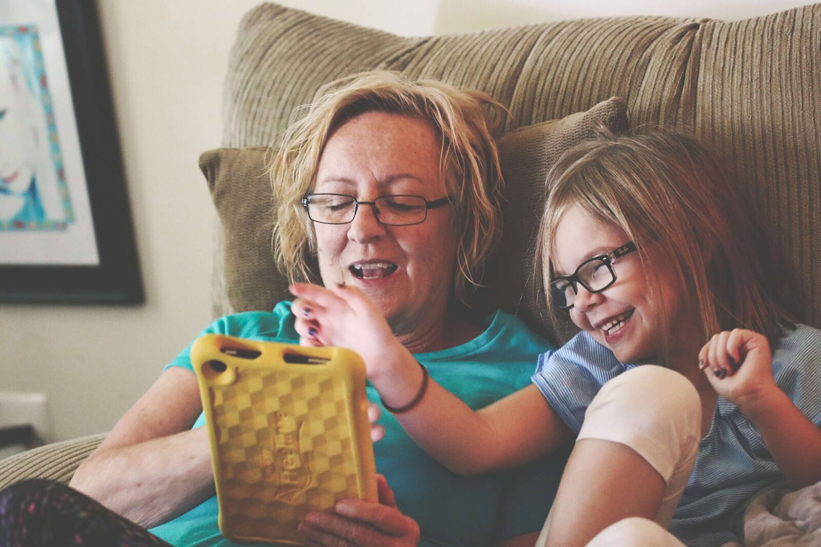 Corporate support can support foster carers like the one depicted in this image with a young child.