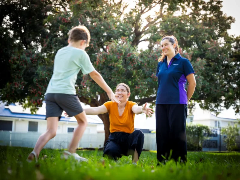 Mother and child in playgroup with anglicare worker