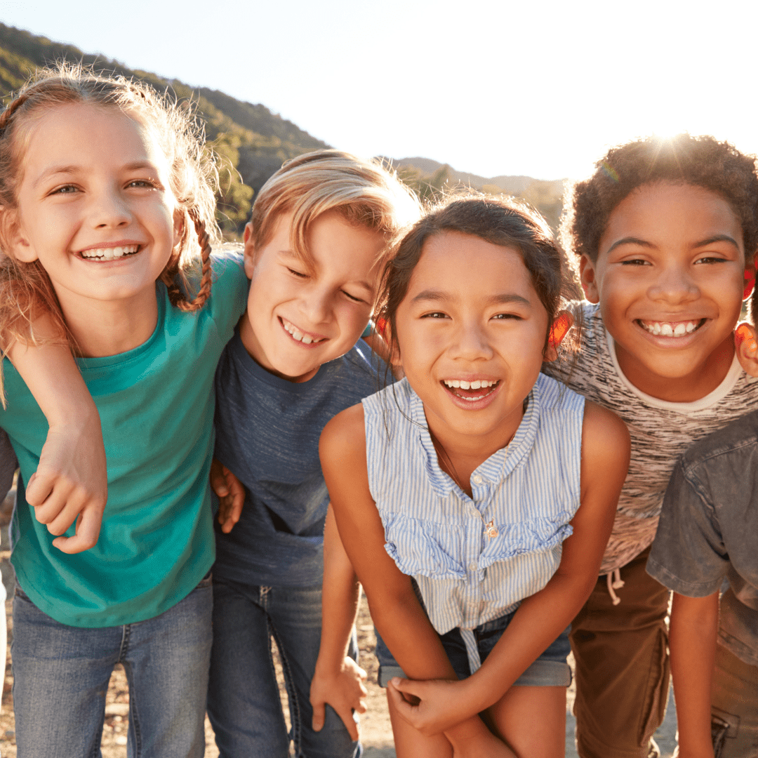 Harmony Week with children.
Four young children posing for picture.