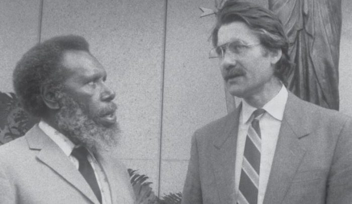 Image of Eddie Mabo (left) and Bryan Keon-Cohen standing outside of the High Court of Australia, prior to the Mabo Case