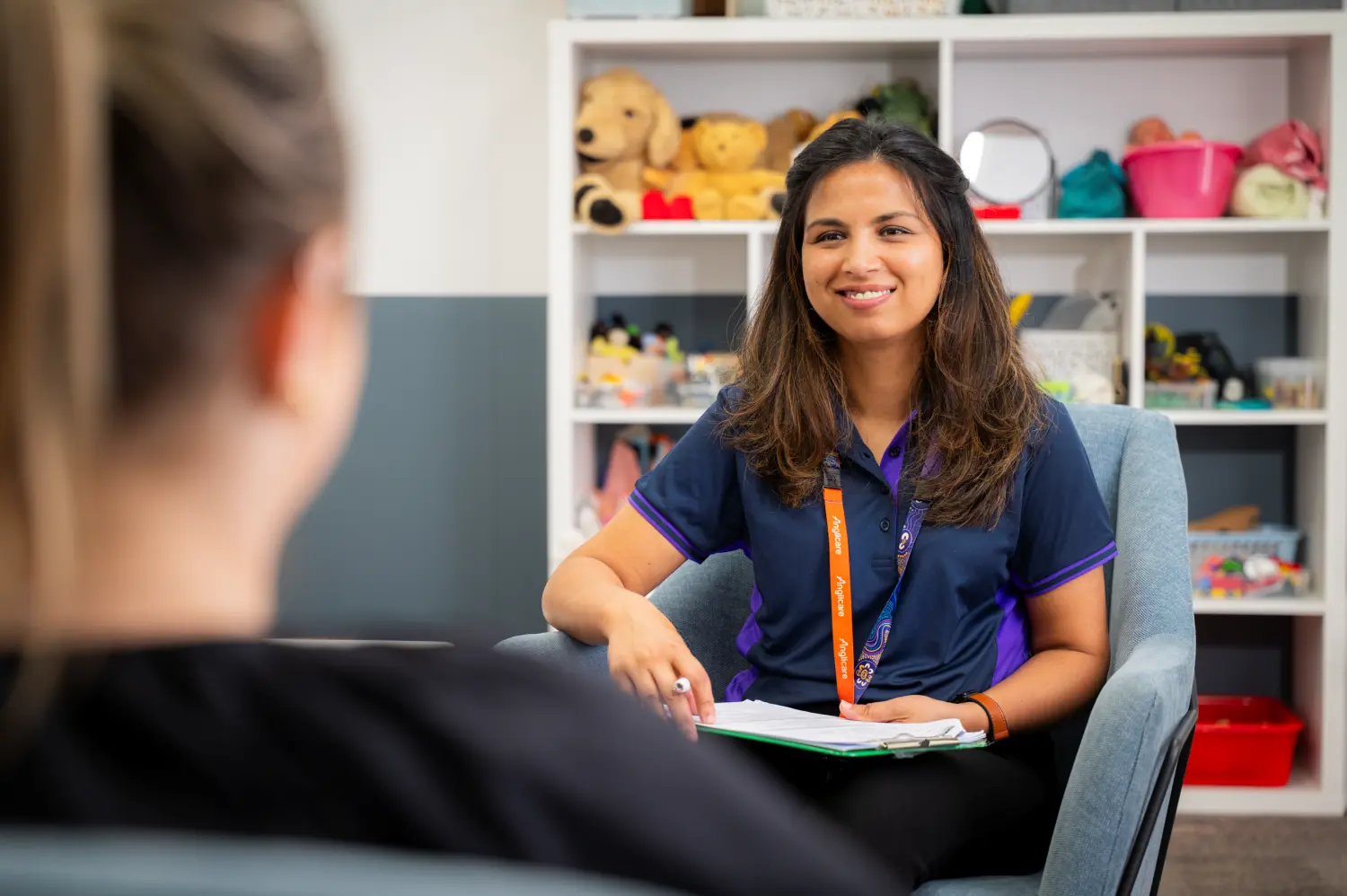 Anglicare counselling session with counsellor and woman
