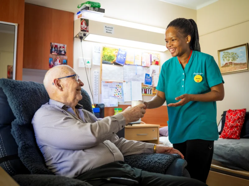 Anglicare nurse supporting dementia care through day‑to‑day assistance.