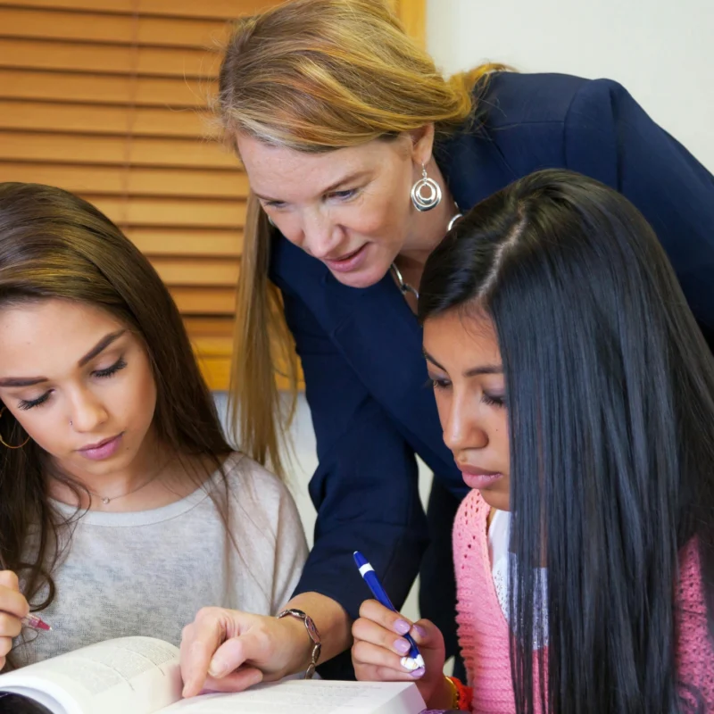 Practitioner helping women to apply for housing in a culturally safe way