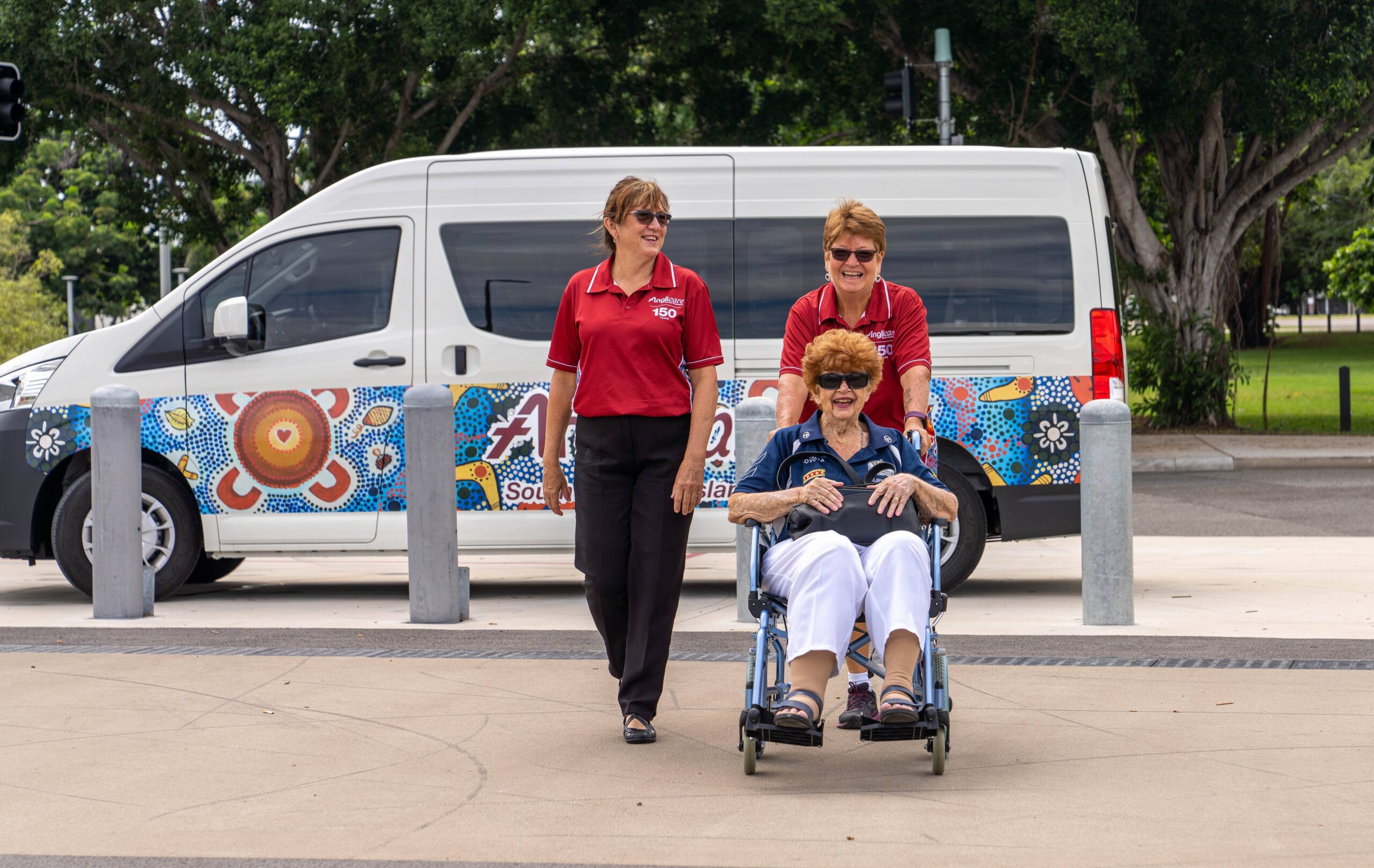 Jenny, Home Care Worker, taking client out for a walk