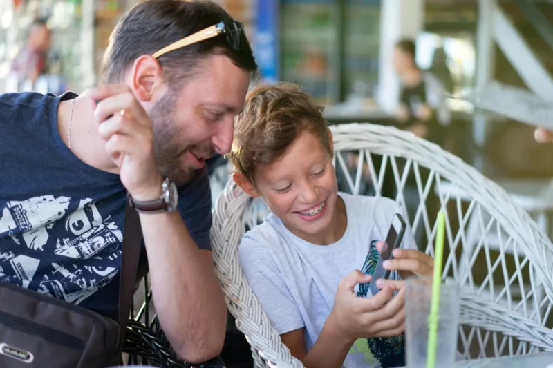 Foster carer actively listening, engaging with and respecting the voice of a child in Queensland foster care.