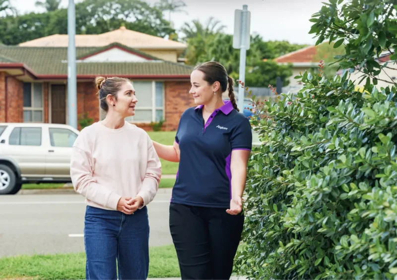 Tenancy support worker meeting tenant in community